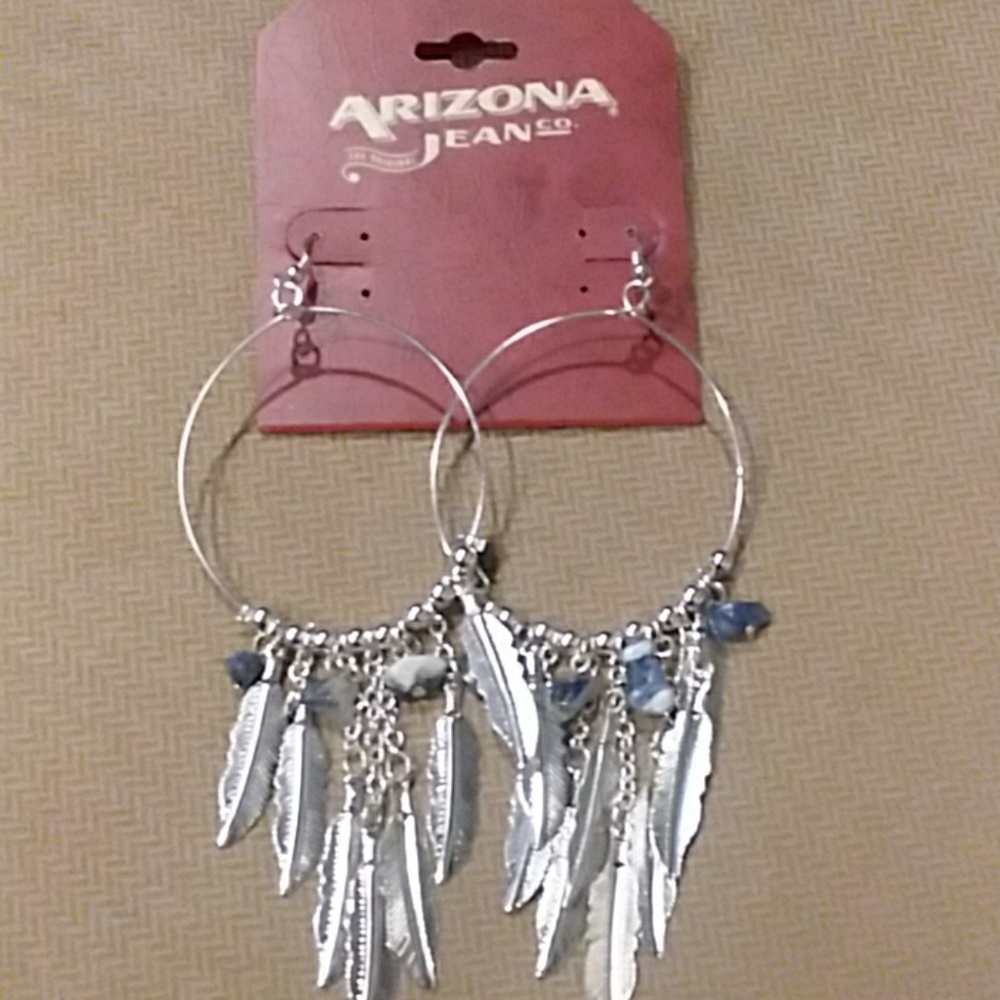 Long dangle earrings with stones